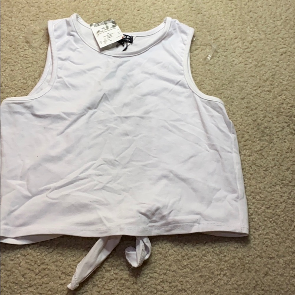 White Crop Top . Back is out. Tank Top Style .